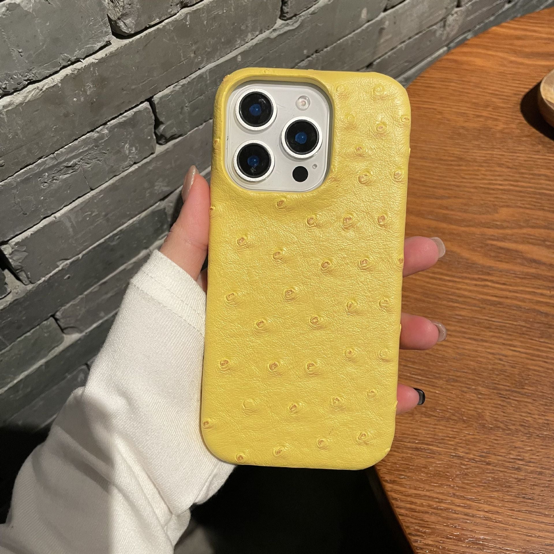 Ostrich pattern leather suitable for Apple 16promax phone case iPhone 15 half pack 14 hard 13 anti drop 12/11